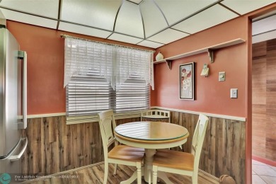 BACK ON THE MARKET!!! PRICE REDUCED AND HOA FEES LOWERED! HUGE on Wynmoor Golf Course in Florida - for sale on GolfHomes.com, golf home, golf lot