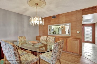 BACK ON THE MARKET!!! PRICE REDUCED AND HOA FEES LOWERED! HUGE on Wynmoor Golf Course in Florida - for sale on GolfHomes.com, golf home, golf lot