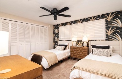 This spacious 2-bedroom, 2.5-bathroom residence with a den on Club at Pelican Bay Golf Course in Florida - for sale on GolfHomes.com, golf home, golf lot