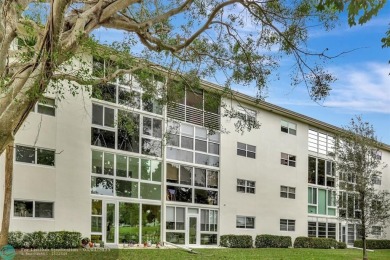 BACK ON THE MARKET!!! PRICE REDUCED AND HOA FEES LOWERED! HUGE on Wynmoor Golf Course in Florida - for sale on GolfHomes.com, golf home, golf lot