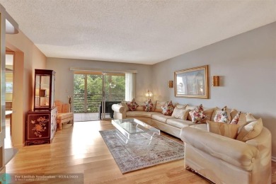 BACK ON THE MARKET!!! PRICE REDUCED AND HOA FEES LOWERED! HUGE on Wynmoor Golf Course in Florida - for sale on GolfHomes.com, golf home, golf lot
