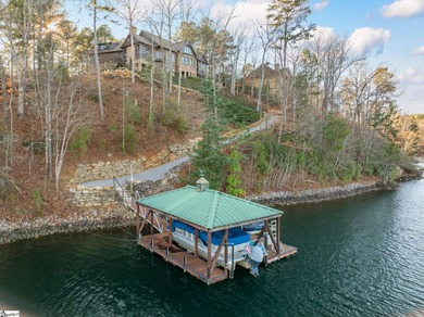 Experience the pinnacle of waterfront living in this on The Cliffs At Keowee Falls in South Carolina - for sale on GolfHomes.com, golf home, golf lot