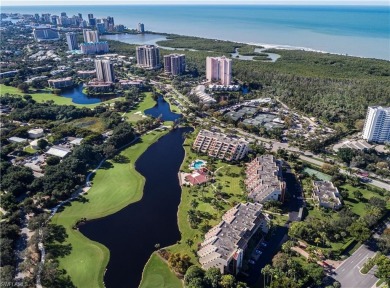 This spacious 2-bedroom, 2.5-bathroom residence with a den on Club at Pelican Bay Golf Course in Florida - for sale on GolfHomes.com, golf home, golf lot