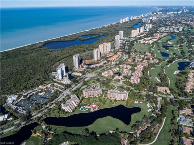 This spacious 2-bedroom, 2.5-bathroom residence with a den on Club at Pelican Bay Golf Course in Florida - for sale on GolfHomes.com, golf home, golf lot