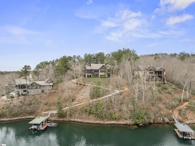 Experience the pinnacle of waterfront living in this on The Cliffs At Keowee Falls in South Carolina - for sale on GolfHomes.com, golf home, golf lot