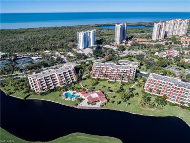 This spacious 2-bedroom, 2.5-bathroom residence with a den on Club at Pelican Bay Golf Course in Florida - for sale on GolfHomes.com, golf home, golf lot