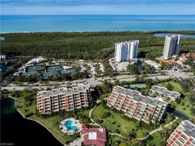 This spacious 2-bedroom, 2.5-bathroom residence with a den on Club at Pelican Bay Golf Course in Florida - for sale on GolfHomes.com, golf home, golf lot