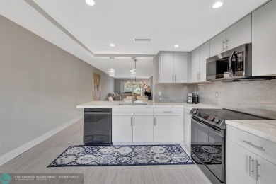 Modern, Fully Furnished Beautiful Updated Corner Unit in on Wynmoor Golf Course in Florida - for sale on GolfHomes.com, golf home, golf lot