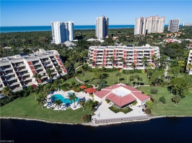 This spacious 2-bedroom, 2.5-bathroom residence with a den on Club at Pelican Bay Golf Course in Florida - for sale on GolfHomes.com, golf home, golf lot