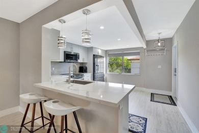 Modern, Fully Furnished Beautiful Updated Corner Unit in on Wynmoor Golf Course in Florida - for sale on GolfHomes.com, golf home, golf lot