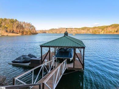Experience the pinnacle of waterfront living in this on The Cliffs At Keowee Falls in South Carolina - for sale on GolfHomes.com, golf home, golf lot