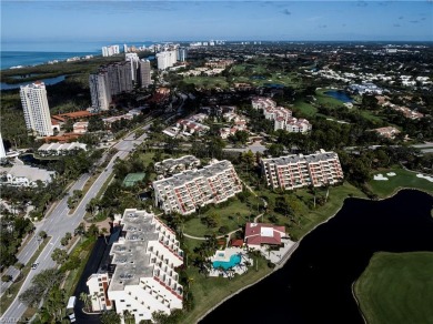 This spacious 2-bedroom, 2.5-bathroom residence with a den on Club at Pelican Bay Golf Course in Florida - for sale on GolfHomes.com, golf home, golf lot