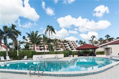 This spacious 2-bedroom, 2.5-bathroom residence with a den on Club at Pelican Bay Golf Course in Florida - for sale on GolfHomes.com, golf home, golf lot