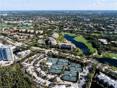 This spacious 2-bedroom, 2.5-bathroom residence with a den on Club at Pelican Bay Golf Course in Florida - for sale on GolfHomes.com, golf home, golf lot