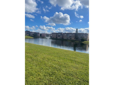 Lovely and well maintained, extended FIRST FLOOR 1/1.5 unit with on Sunrise Lakes Phase III in Florida - for sale on GolfHomes.com, golf home, golf lot
