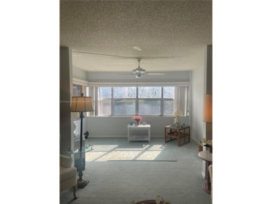 Lovely and well maintained, extended FIRST FLOOR 1/1.5 unit with on Sunrise Lakes Phase III in Florida - for sale on GolfHomes.com, golf home, golf lot