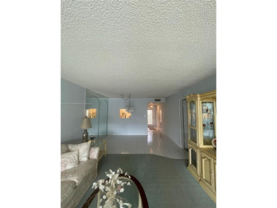 Lovely and well maintained, extended FIRST FLOOR 1/1.5 unit with on Sunrise Lakes Phase III in Florida - for sale on GolfHomes.com, golf home, golf lot