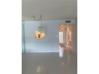 Lovely and well maintained, extended FIRST FLOOR 1/1.5 unit with on Sunrise Lakes Phase III in Florida - for sale on GolfHomes.com, golf home, golf lot