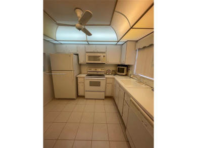 Lovely and well maintained, extended FIRST FLOOR 1/1.5 unit with on Sunrise Lakes Phase III in Florida - for sale on GolfHomes.com, golf home, golf lot