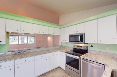 Featuring a rare 3 CAR GARAGE, this newer construction 3-bedroom on Oyster Creek Golf Club in Florida - for sale on GolfHomes.com, golf home, golf lot