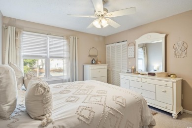 Welcome to your cozy coastal retreat! This charming two-bedroom on Cane Patch Driving Range in South Carolina - for sale on GolfHomes.com, golf home, golf lot