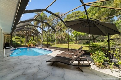 Welcome to your private oasis in Country Club Estates! Tucked on St. Lucie Trail Golf Club in Florida - for sale on GolfHomes.com, golf home, golf lot