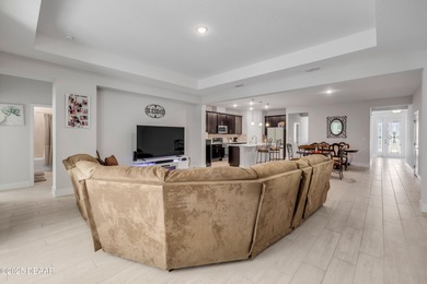 Discover this 4-bed, 3-bath home in Halifax Plantation with 2 on Halifax Plantation Golf Club in Florida - for sale on GolfHomes.com, golf home, golf lot