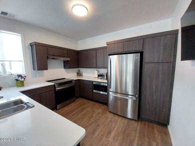 Beautifully Renovated Townhouse overlooking Woodloch Springs on Woodloch Springs Country Club in Pennsylvania - for sale on GolfHomes.com, golf home, golf lot