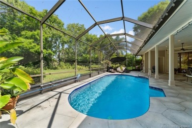 Welcome to your private oasis in Country Club Estates! Tucked on St. Lucie Trail Golf Club in Florida - for sale on GolfHomes.com, golf home, golf lot