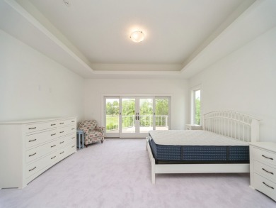 Welcome to this stunning walk-out ranch located in the Glen Oaks on Glen Oaks Country Club in Iowa - for sale on GolfHomes.com, golf home, golf lot