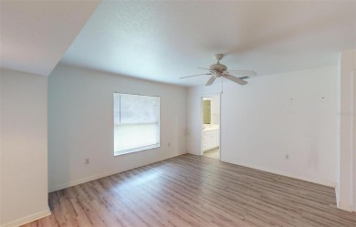 Featuring a rare 3 CAR GARAGE, this newer construction 3-bedroom on Oyster Creek Golf Club in Florida - for sale on GolfHomes.com, golf home, golf lot