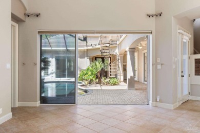 Experience luxury coastal living in this 4-bedroom, 4-bathroom on Kelly Plantation Golf Club in Florida - for sale on GolfHomes.com, golf home, golf lot