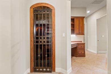 Experience luxury coastal living in this 4-bedroom, 4-bathroom on Kelly Plantation Golf Club in Florida - for sale on GolfHomes.com, golf home, golf lot