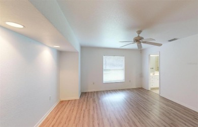 Featuring a rare 3 CAR GARAGE, this newer construction 3-bedroom on Oyster Creek Golf Club in Florida - for sale on GolfHomes.com, golf home, golf lot
