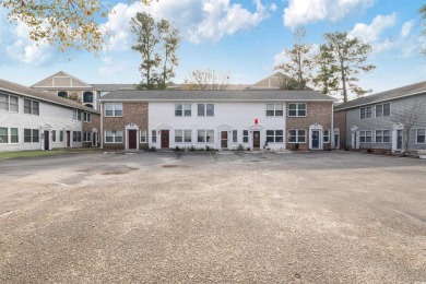 Welcome to your cozy coastal retreat! This charming two-bedroom on Cane Patch Driving Range in South Carolina - for sale on GolfHomes.com, golf home, golf lot