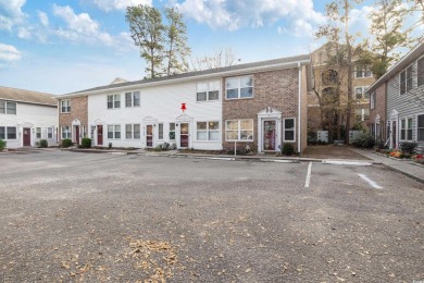 Welcome to your cozy coastal retreat! This charming two-bedroom on Cane Patch Driving Range in South Carolina - for sale on GolfHomes.com, golf home, golf lot