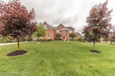 This stunning North-West facing colonial home, featuring 4 on The Inn At St. Johns Golf Course - Mark in Michigan - for sale on GolfHomes.com, golf home, golf lot