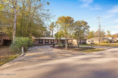 Resort-Style Living in Diamondhead, MS: Coastal Access and on Diamondhead Country Club in Mississippi - for sale on GolfHomes.com, golf home, golf lot