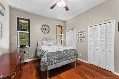 Welcome to your private oasis in Country Club Estates! Tucked on St. Lucie Trail Golf Club in Florida - for sale on GolfHomes.com, golf home, golf lot