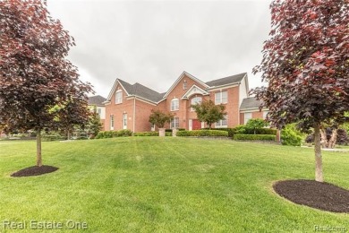 This stunning North-West facing colonial home, featuring 4 on The Inn At St. Johns Golf Course - Mark in Michigan - for sale on GolfHomes.com, golf home, golf lot