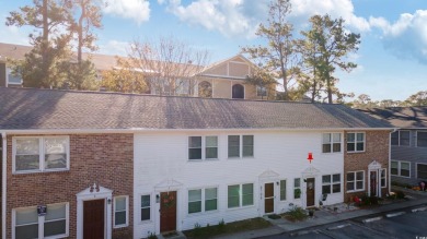 Welcome to your cozy coastal retreat! This charming two-bedroom on Cane Patch Driving Range in South Carolina - for sale on GolfHomes.com, golf home, golf lot