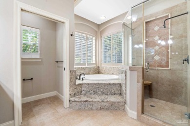 Experience luxury coastal living in this 4-bedroom, 4-bathroom on Kelly Plantation Golf Club in Florida - for sale on GolfHomes.com, golf home, golf lot