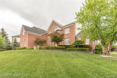 This stunning North-West facing colonial home, featuring 4 on The Inn At St. Johns Golf Course - Mark in Michigan - for sale on GolfHomes.com, golf home, golf lot