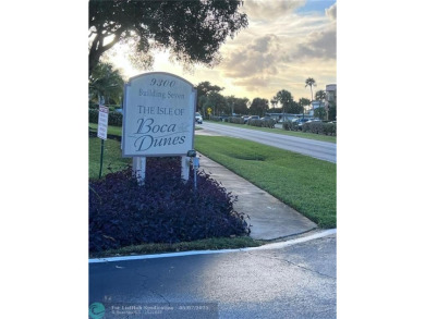 ALL AGES..E SEE IT RIGHT NOW...FIRST FLOOR END CORNER UNIT on Boca Dunes Golf and Country Club in Florida - for sale on GolfHomes.com, golf home, golf lot