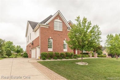 This stunning North-West facing colonial home, featuring 4 on The Inn At St. Johns Golf Course - Mark in Michigan - for sale on GolfHomes.com, golf home, golf lot