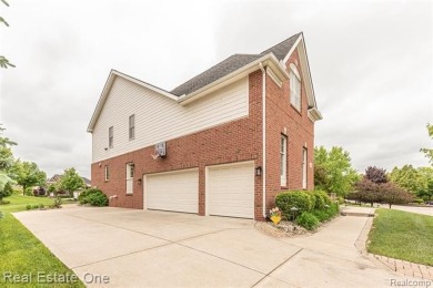 This stunning North-West facing colonial home, featuring 4 on The Inn At St. Johns Golf Course - Mark in Michigan - for sale on GolfHomes.com, golf home, golf lot