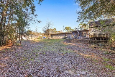 Resort-Style Living in Diamondhead, MS: Coastal Access and on Diamondhead Country Club in Mississippi - for sale on GolfHomes.com, golf home, golf lot