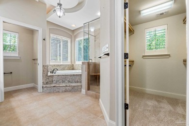 Experience luxury coastal living in this 4-bedroom, 4-bathroom on Kelly Plantation Golf Club in Florida - for sale on GolfHomes.com, golf home, golf lot