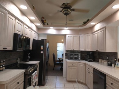 Experience the best of Florida living at 4710 W Mustang on Black Diamond Ranch Golf Course in Florida - for sale on GolfHomes.com, golf home, golf lot