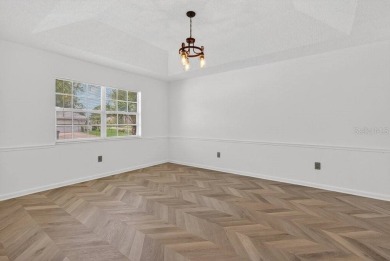 One or more photo(s) has been virtually staged. Welcome to your on The Grand Club - Pine Lakes Course in Florida - for sale on GolfHomes.com, golf home, golf lot